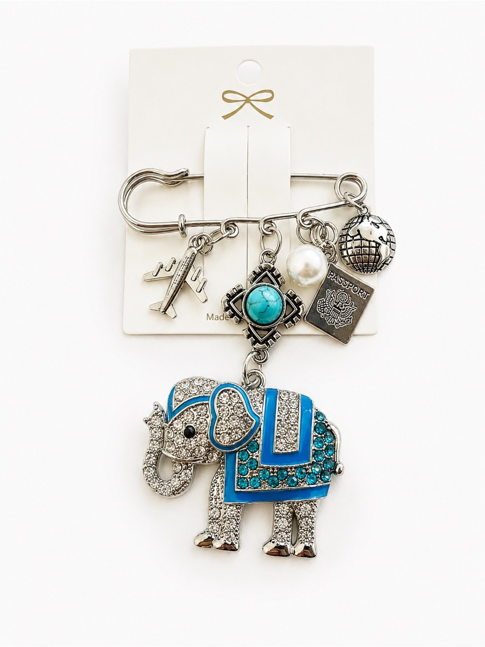 Silver Elephant Charm Brooch with Blue Accents
